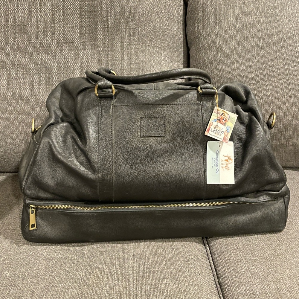 NWT Ethiopian leather black weekender with separate pocket on bottom for shoes